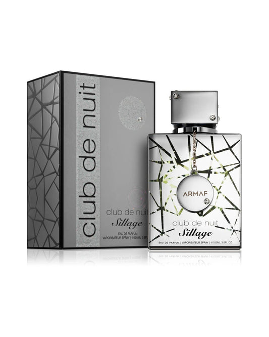 Banner pubblicitario per il profumo Armaf Club de Nuit Sillage, con testo "Nuovo Lancio", "Sveglia i tuoi sensi con Armaf" e codice QR per ordinare.