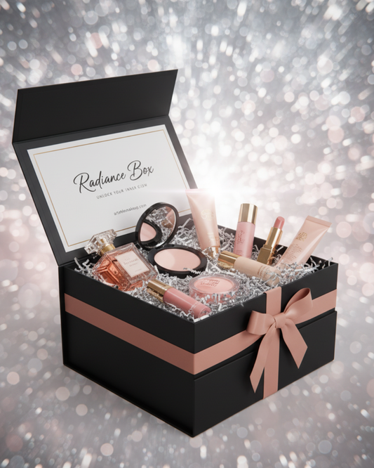 Radiance Box di artedelmakeup.com, mystery box beauty nera con fiocco rosa e prodotti make up e profumi all'interno