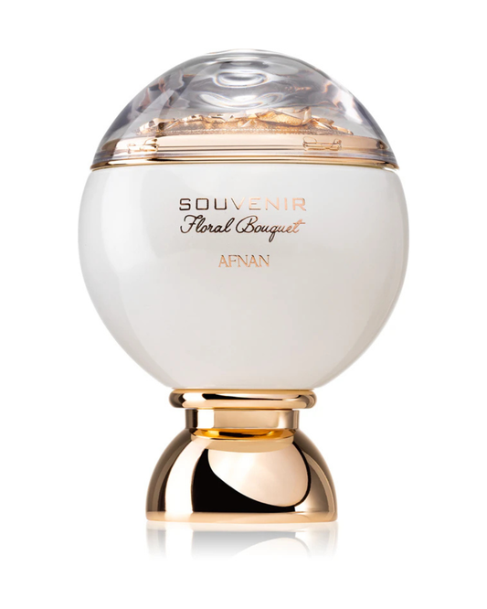 Dettaglio del flacone sferico bianco del profumo Afnan Souvenir Floral Bouquet, con tappo trasparente che racchiude rose dorate scolpite.