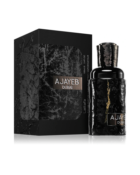 Profumo unisex Ajayeb Dubai di Lattafa. Vista completa con l'elegante scatola nera testurizzata e il flacone nero lucido con dettagli dorati
